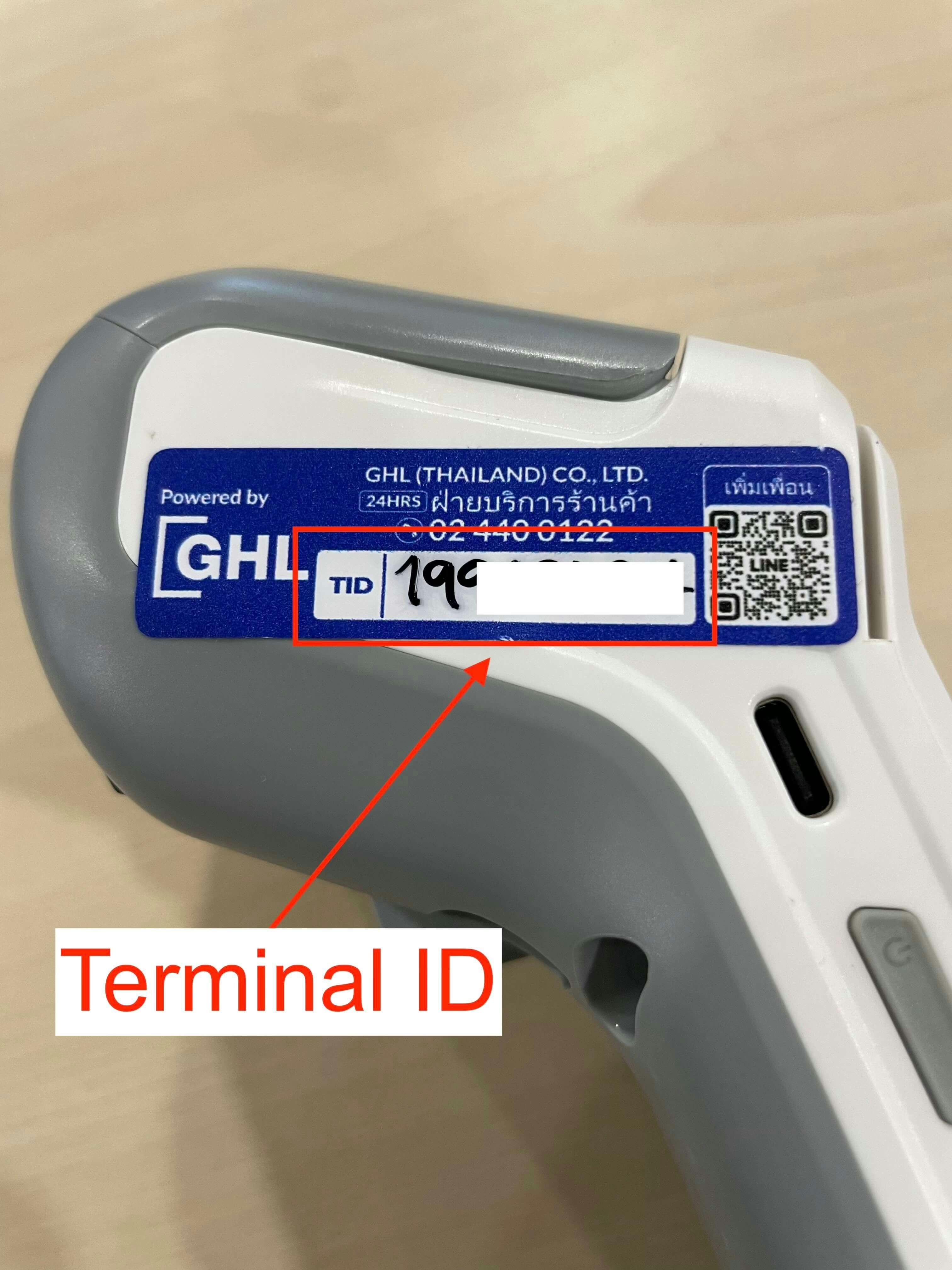 NTT terminal showing Terminal ID sticker on device
