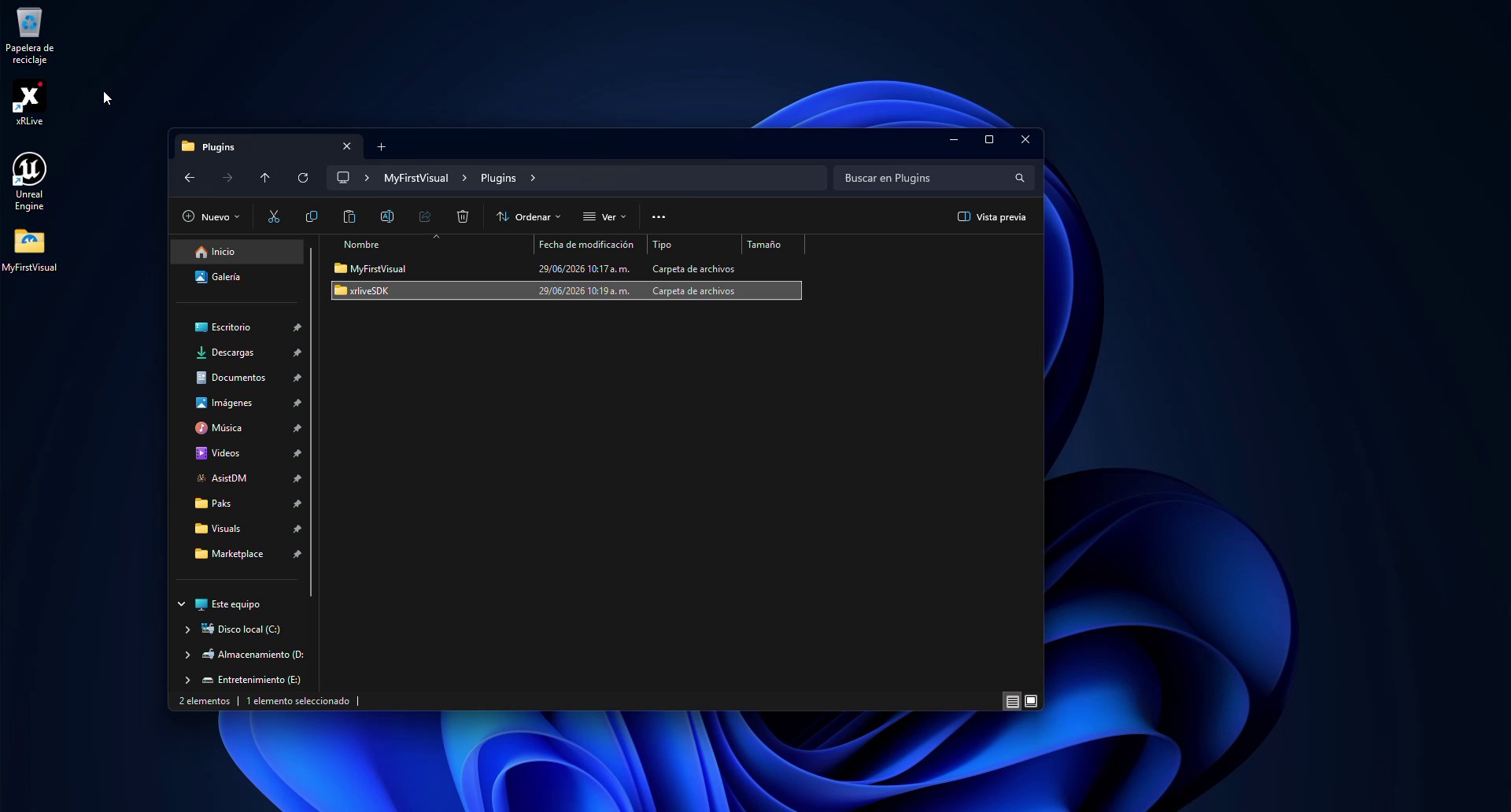 Windows Explorer showing the Plugins folder containing two folders: MyFirstVisual and xrliveSDK