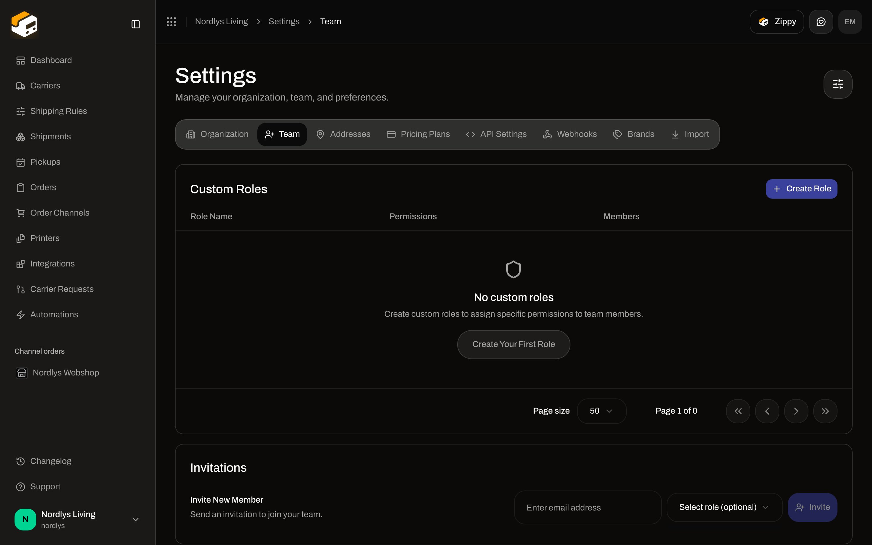 Invite New Member row with the Select role dropdown open; no custom roles yet