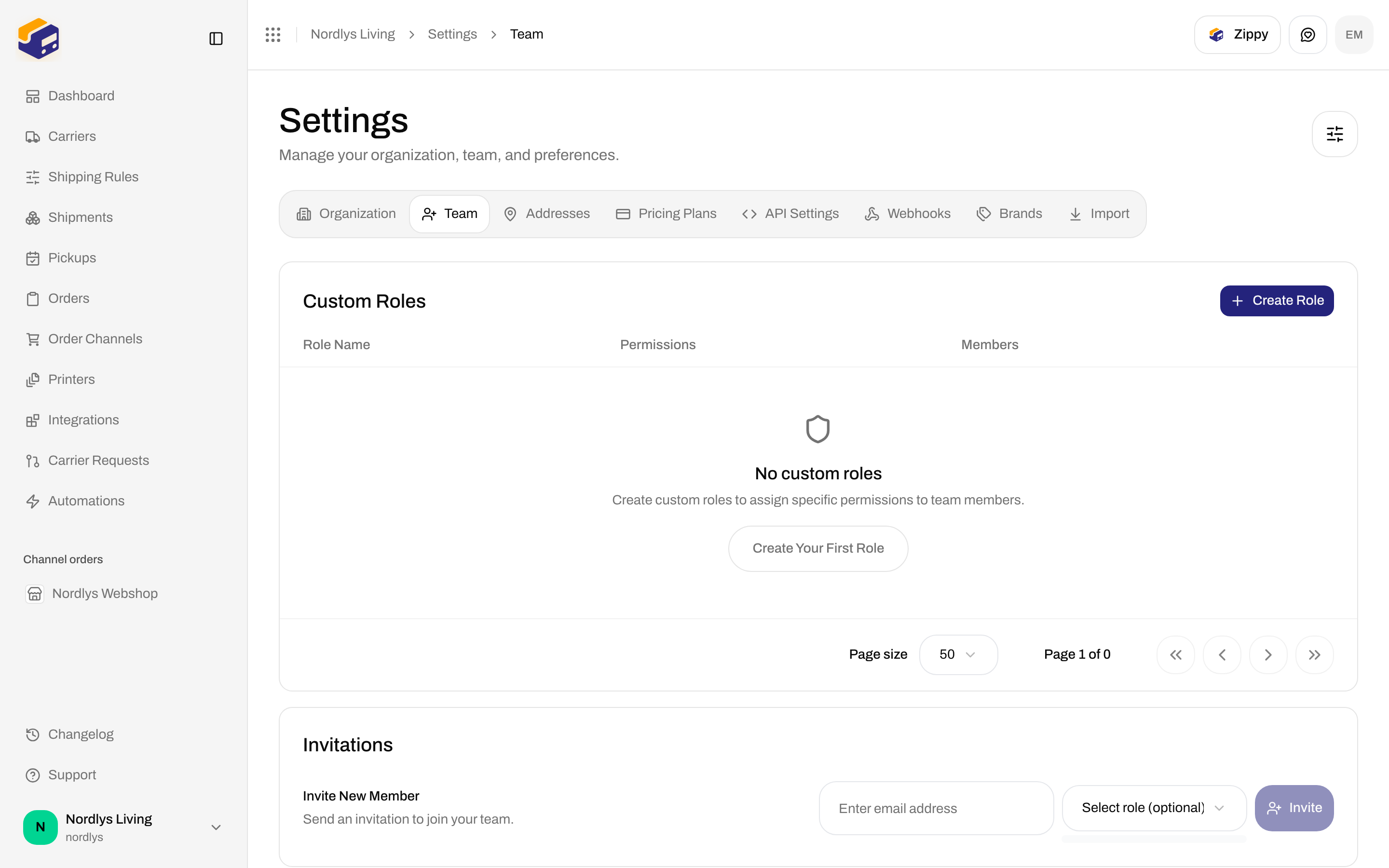 Invite New Member row with the Select role dropdown open; no custom roles yet
