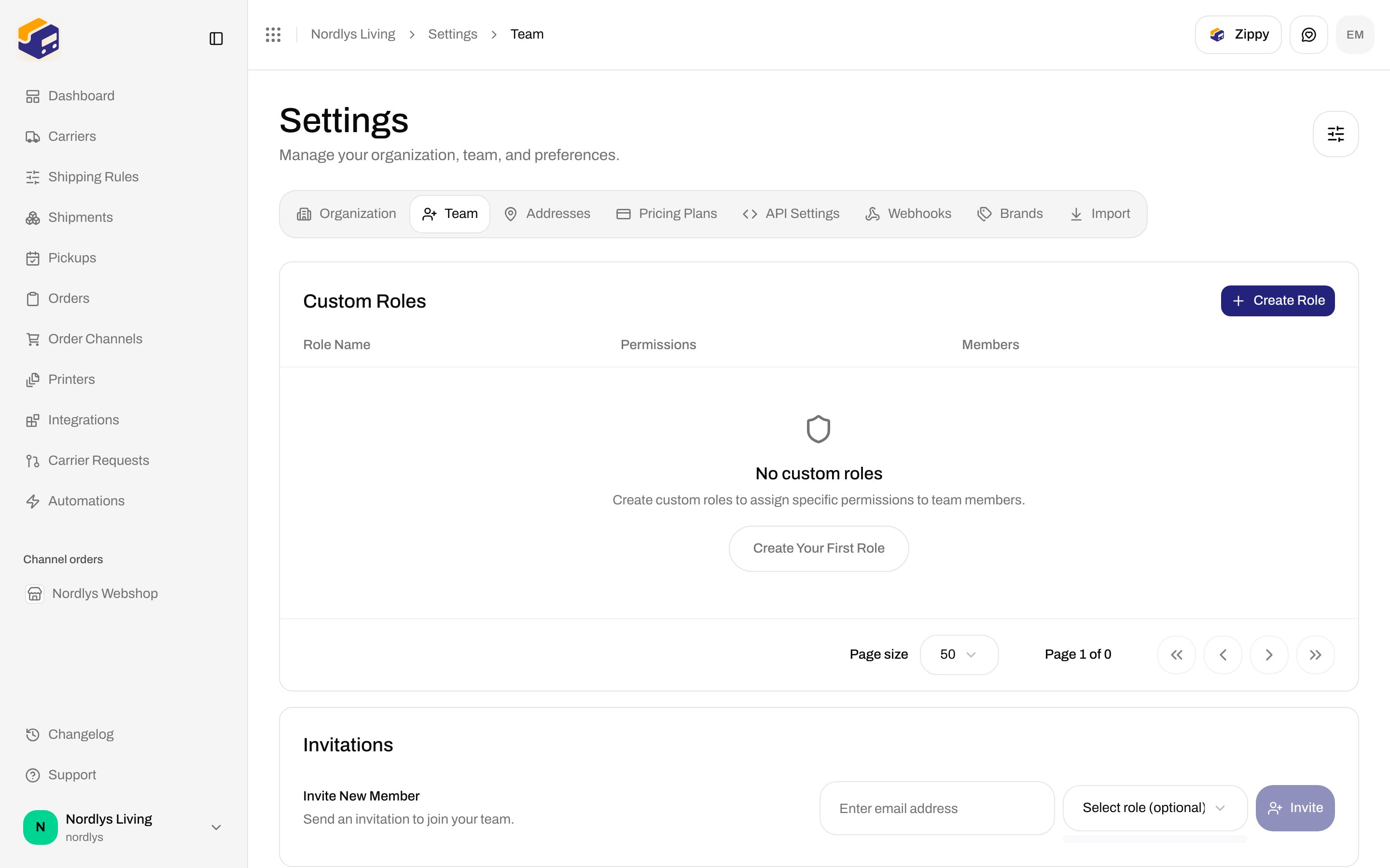 Invite New Member row with the Select role dropdown open; no custom roles yet