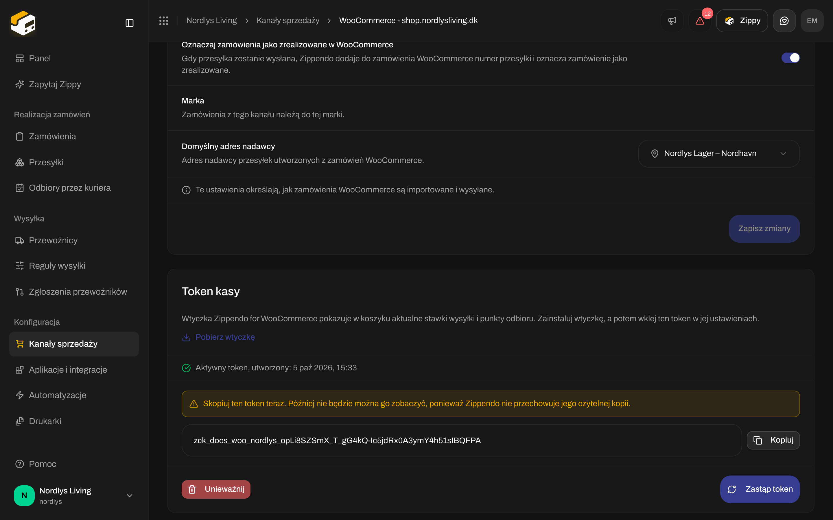 Karta tokena kasy z jednorazowym ostrzeżeniem, tokenem oraz przyciskami Kopiuj, Unieważnij i Zastąp token