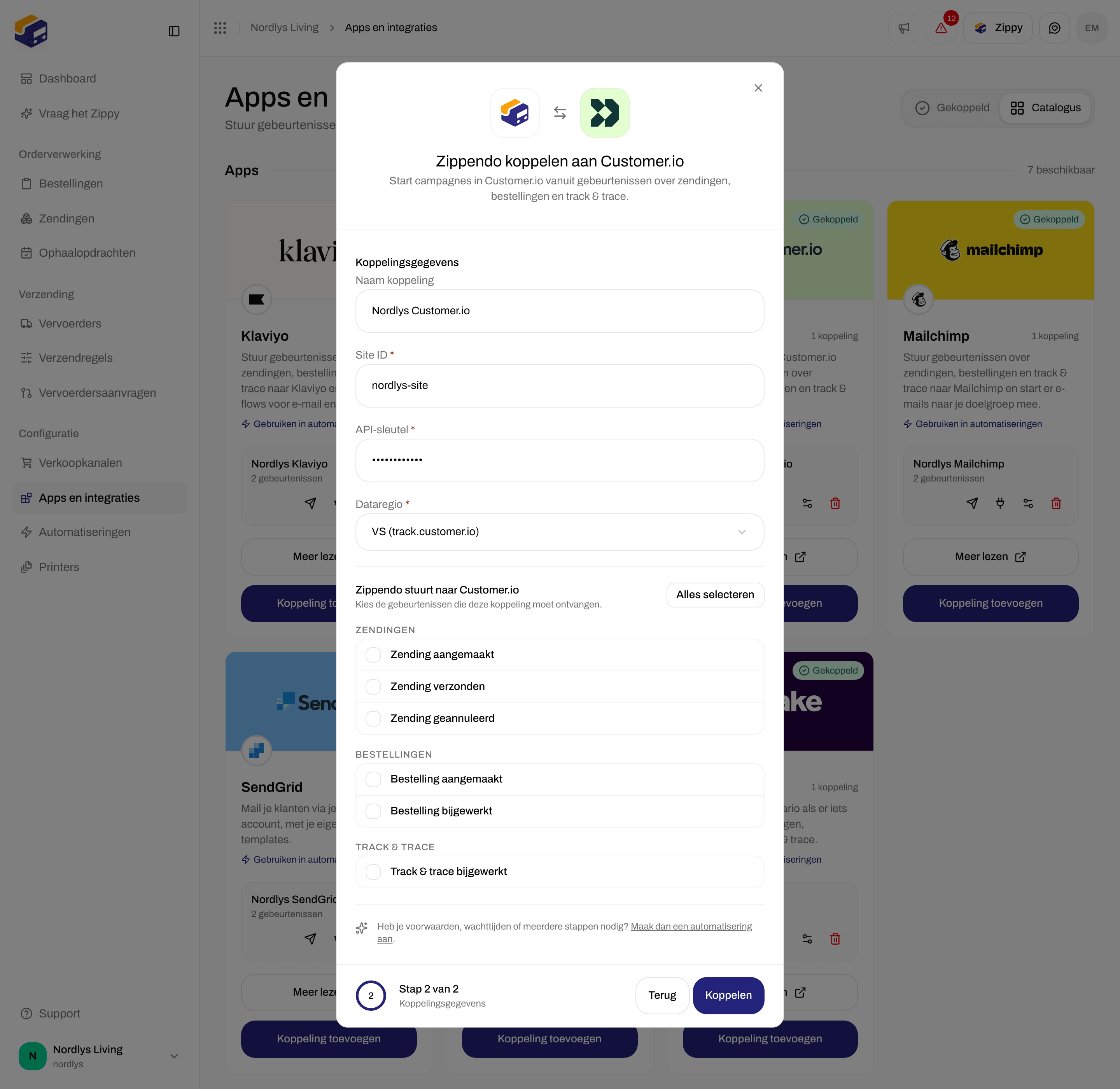Koppelvenster voor Customer.io met een naam voor de koppeling, Site ID, API-sleutel, Dataregio en selectievakjes voor gebeurtenissen