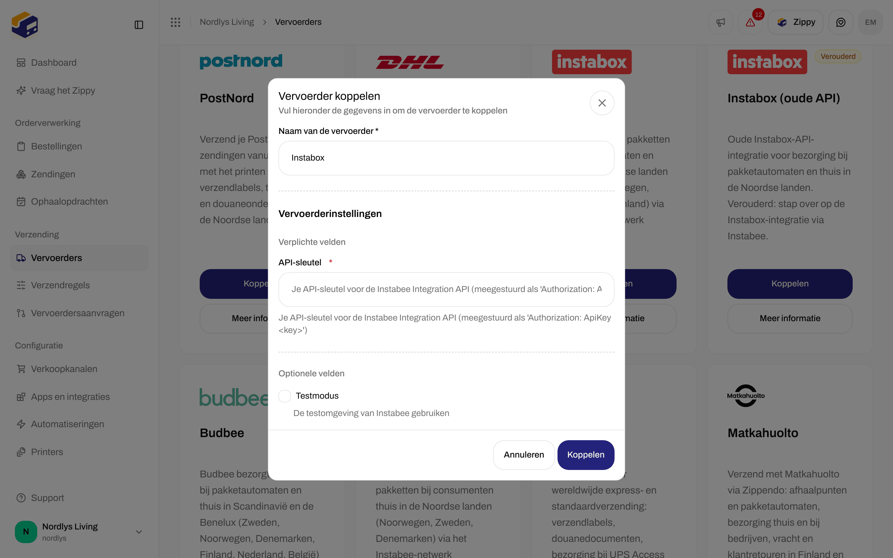 Venster Vervoerder koppelen voor Instabox met de verplichte API-sleutel en de optionele Testmodus