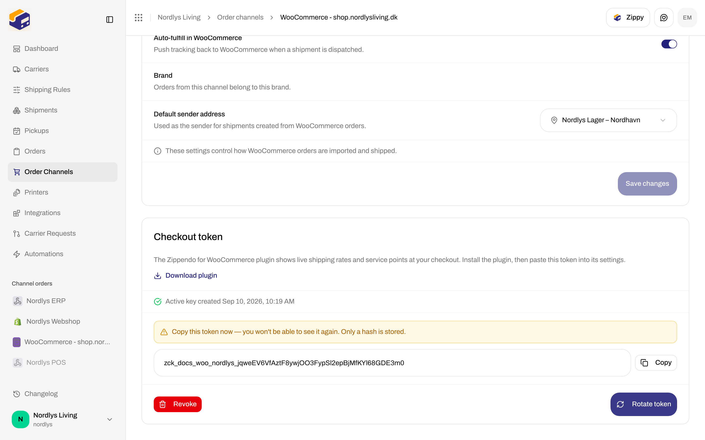 Checkout token card with one-time warning, zck_ token, Copy, Revoke, and Rotate token