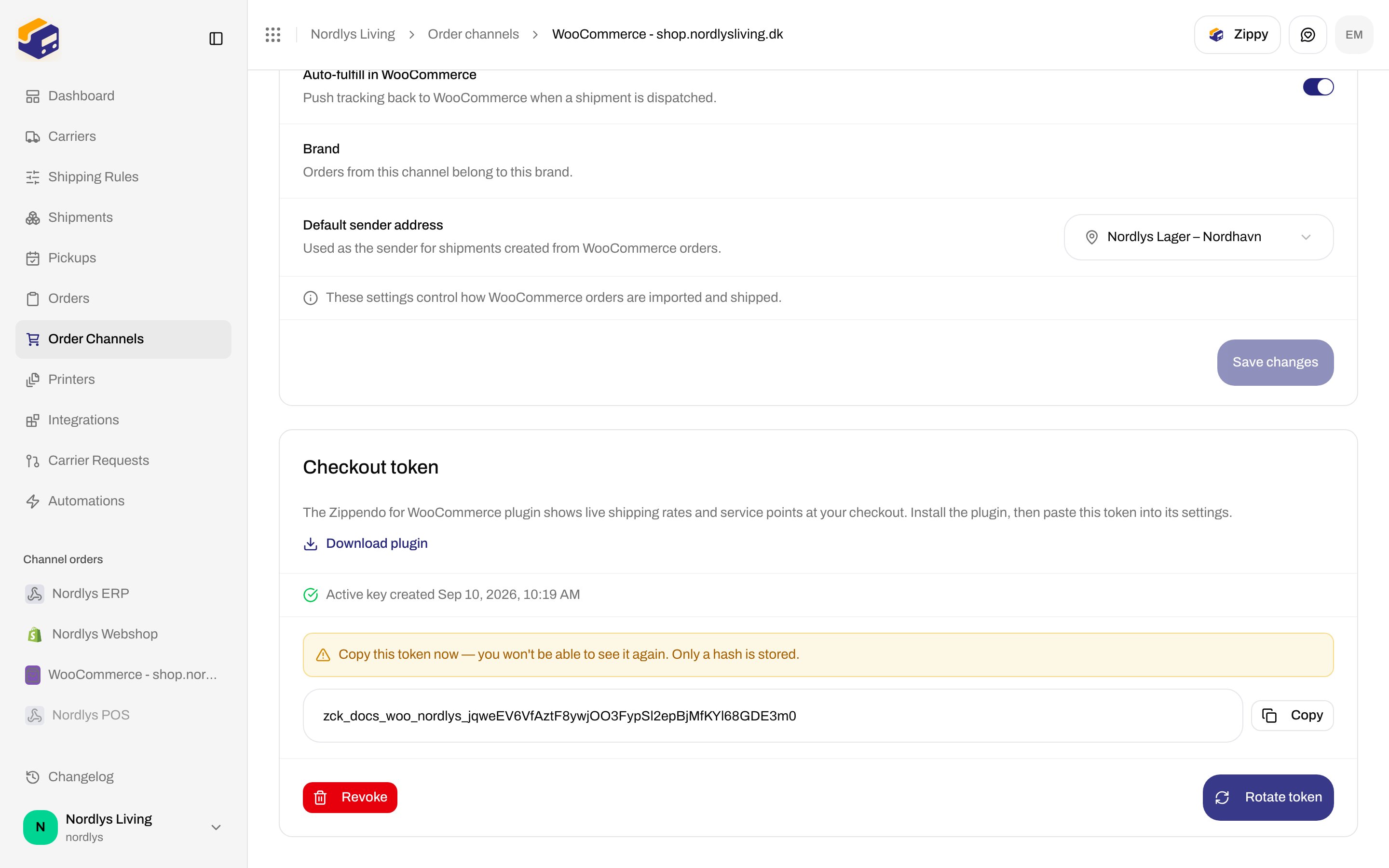 Checkout token card with one-time warning, zck_ token, Copy, Revoke, and Rotate token