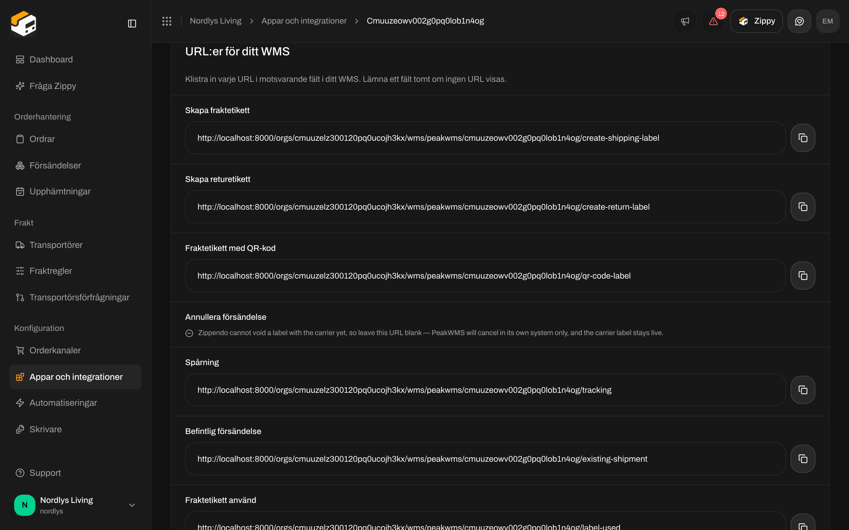 Avsnittet URL:er för ditt WMS som listar Skapa fraktetikett, Skapa returetikett, Fraktetikett med QR-kod, Spårning, Befintlig försändelse och Fraktetikett använd med kopieringsknappar