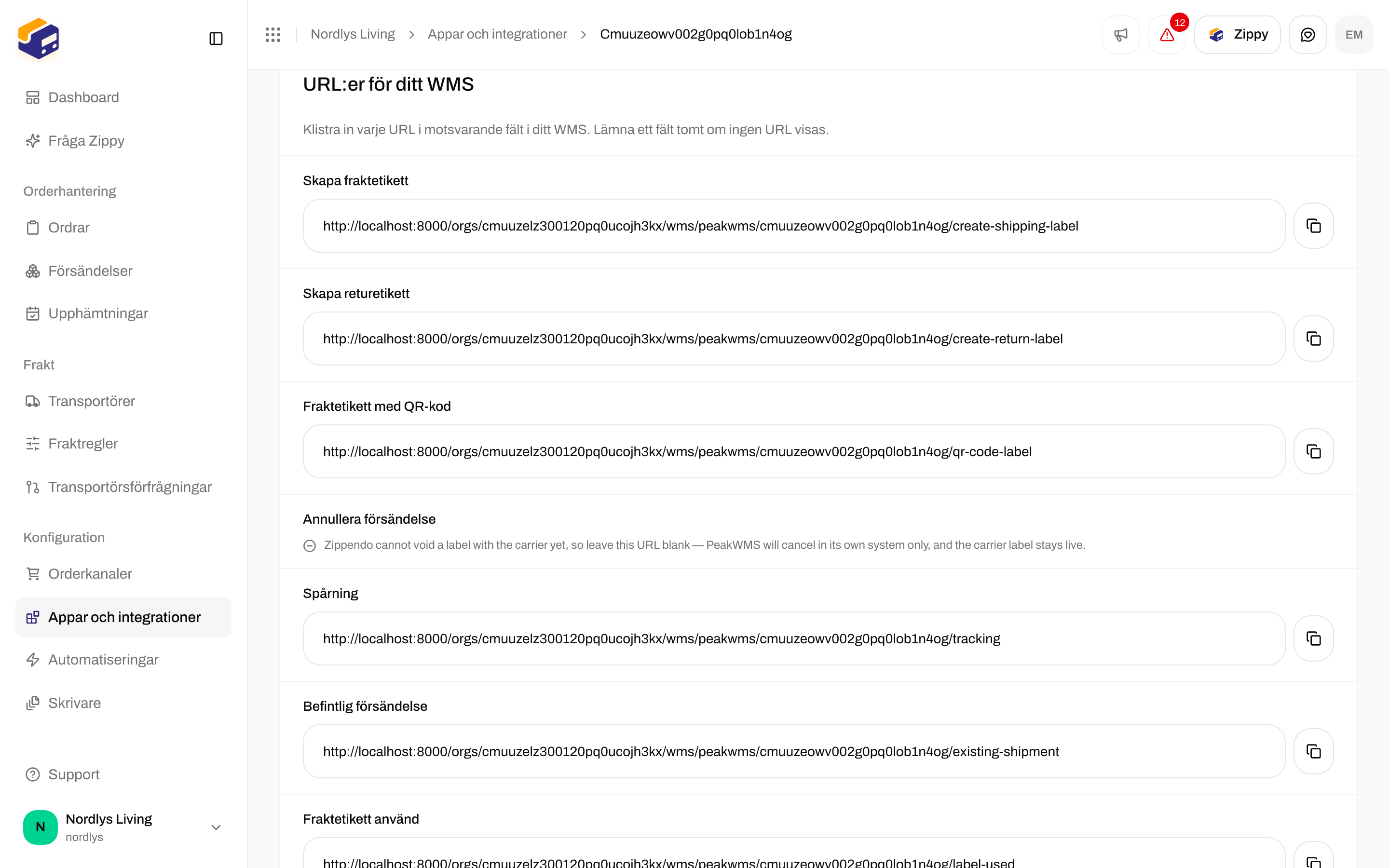 Avsnittet URL:er för ditt WMS som listar Skapa fraktetikett, Skapa returetikett, Fraktetikett med QR-kod, Spårning, Befintlig försändelse och Fraktetikett använd med kopieringsknappar