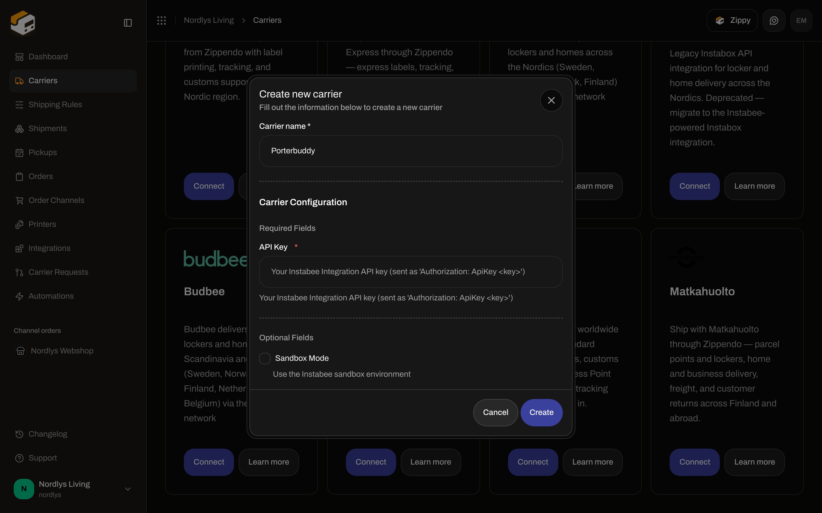 Create new carrier dialog for Porterbuddy with required API Key and optional Sandbox Mode