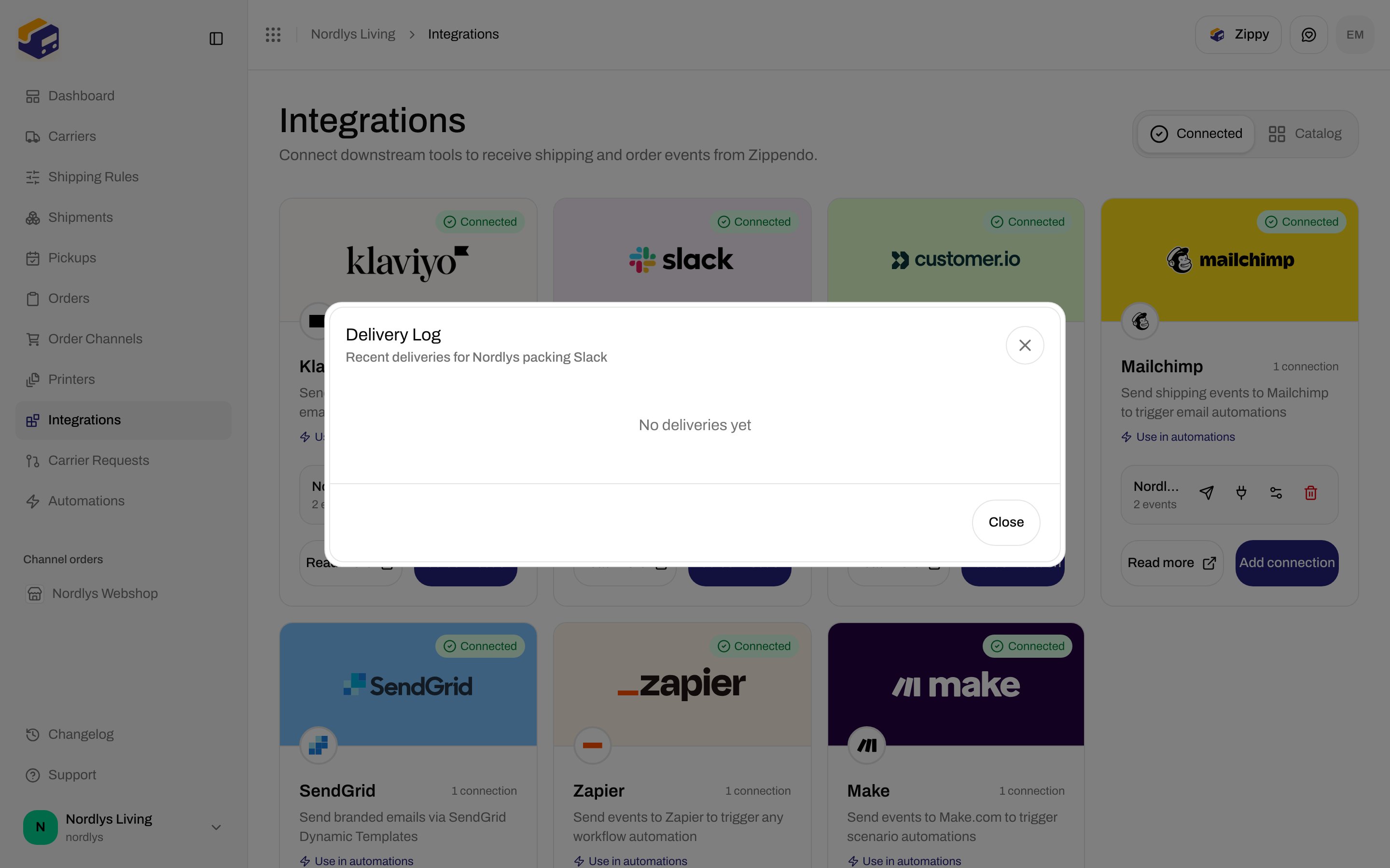 Delivery Log modal showing No deliveries yet for a Slack connection