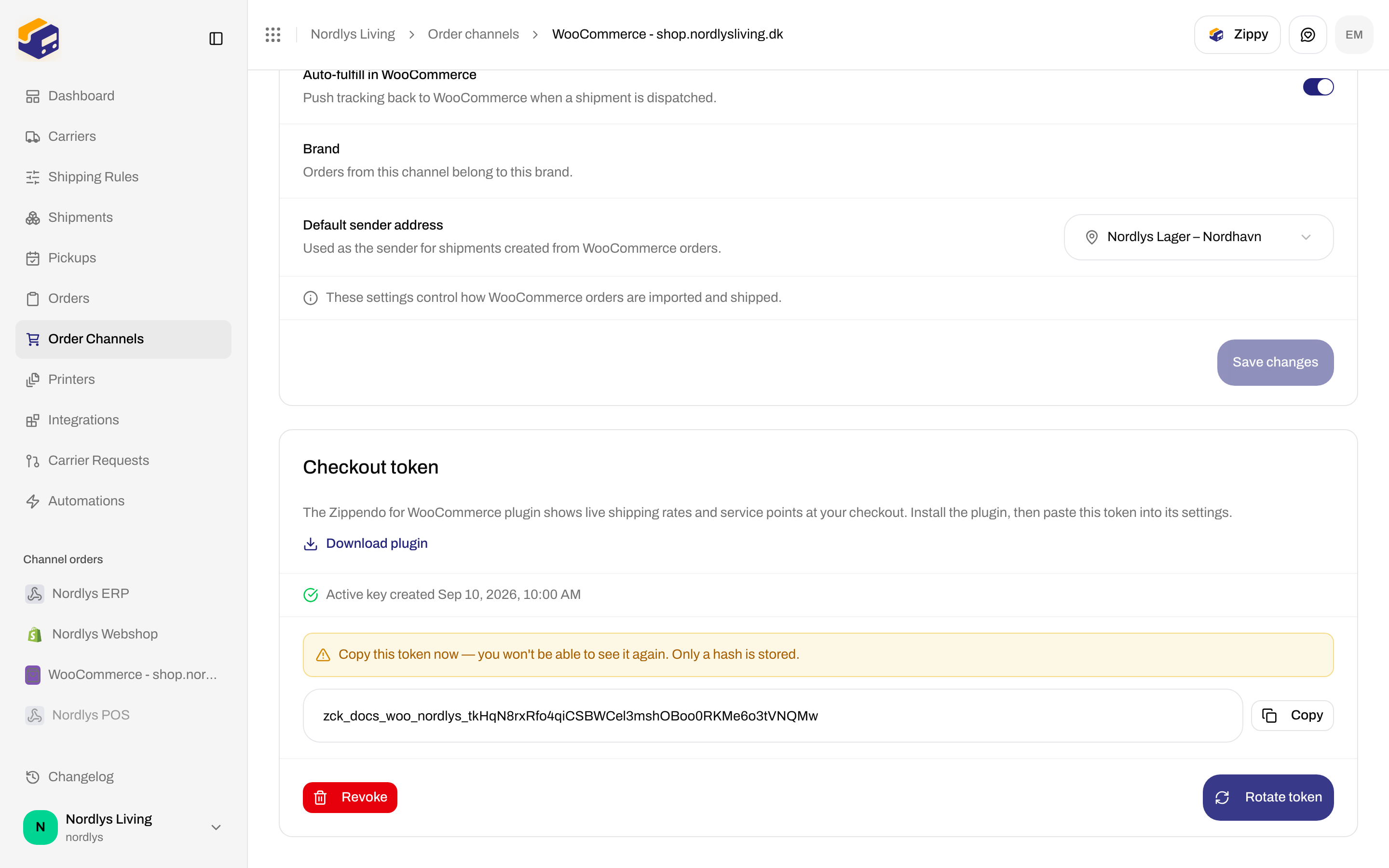 Checkout token card with one-time warning, zck_ token, Copy, Revoke, and Rotate token