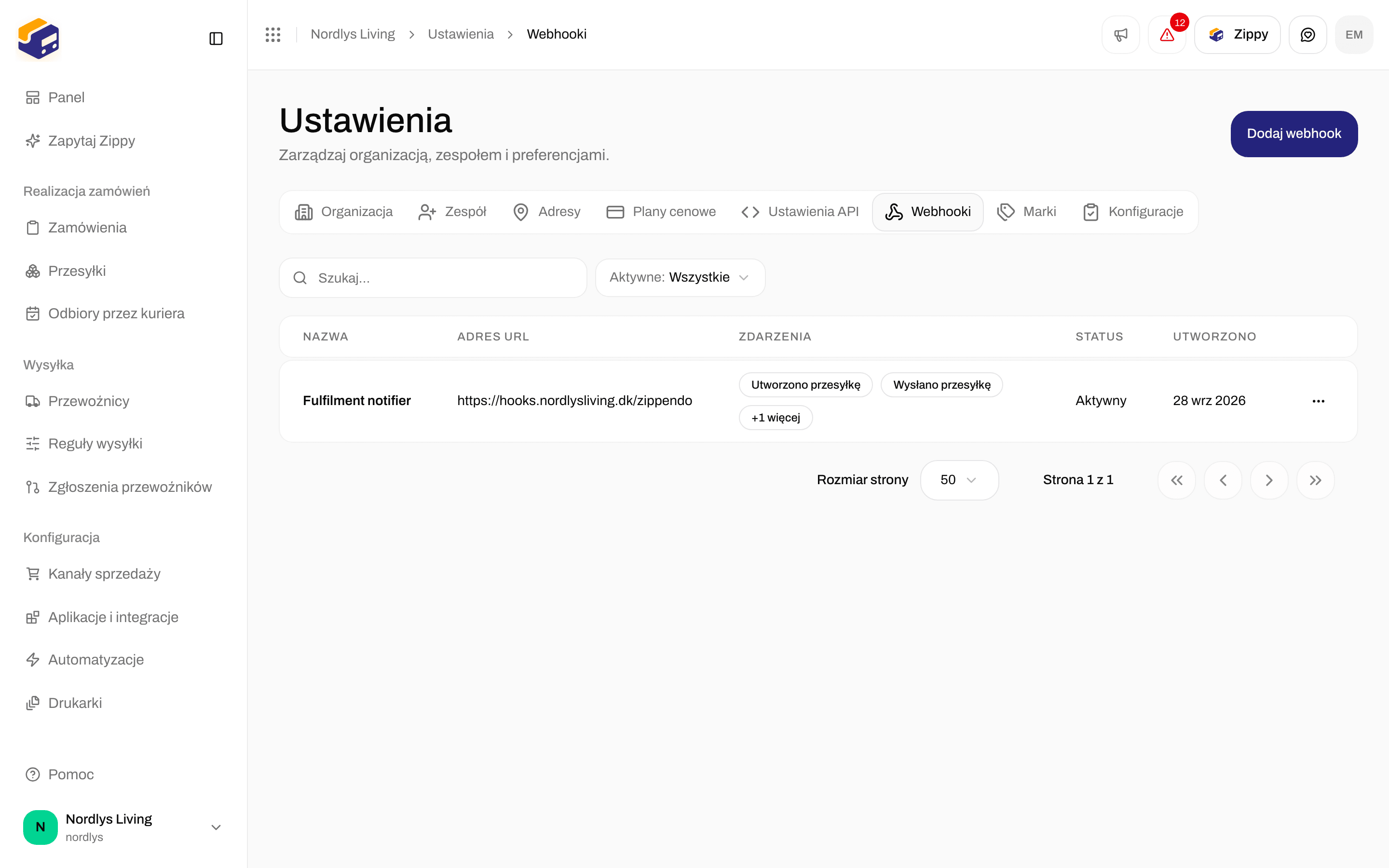 Lista webhooków w Ustawieniach z webhookiem zapisanym na zdarzenia przesyłek i śledzenia