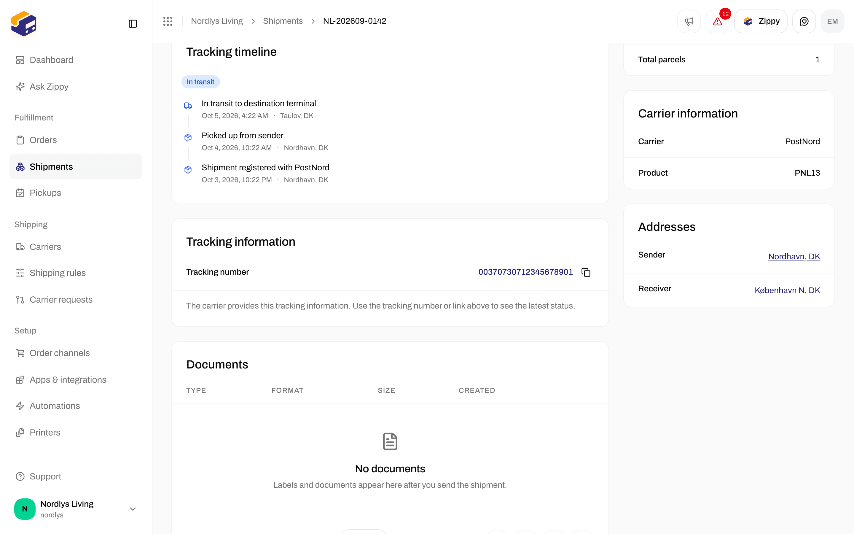 Shipment tracking sections with an In transit status, the list of scans, and the tracking number