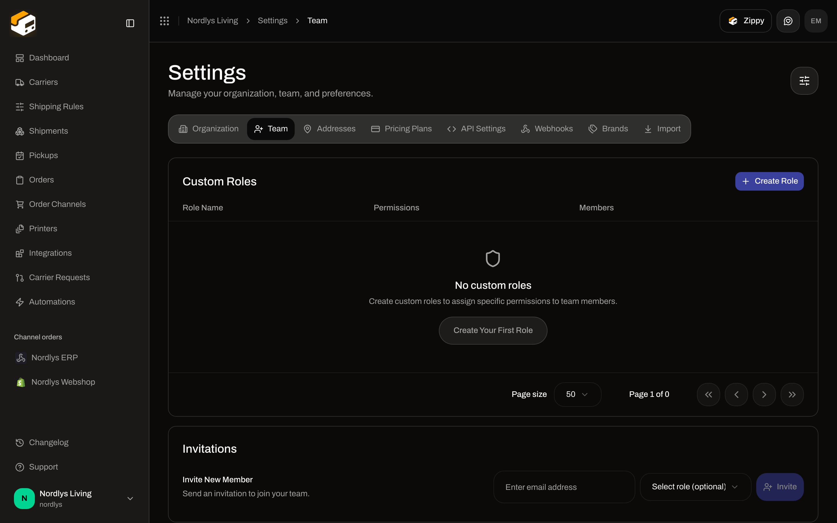 Team tab with an empty Custom Roles table and Invite New Member