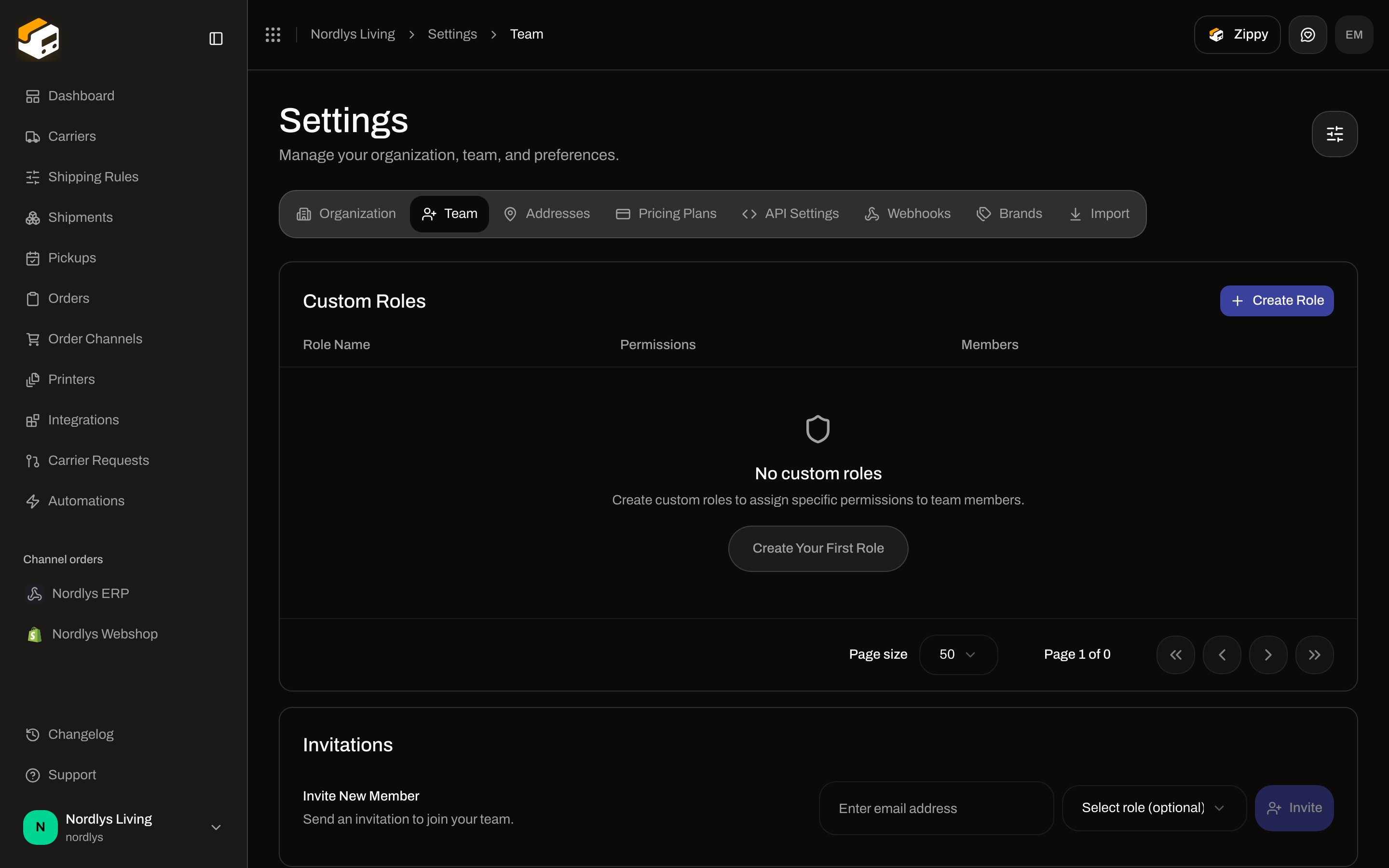 Team tab with an empty Custom Roles table and Invite New Member