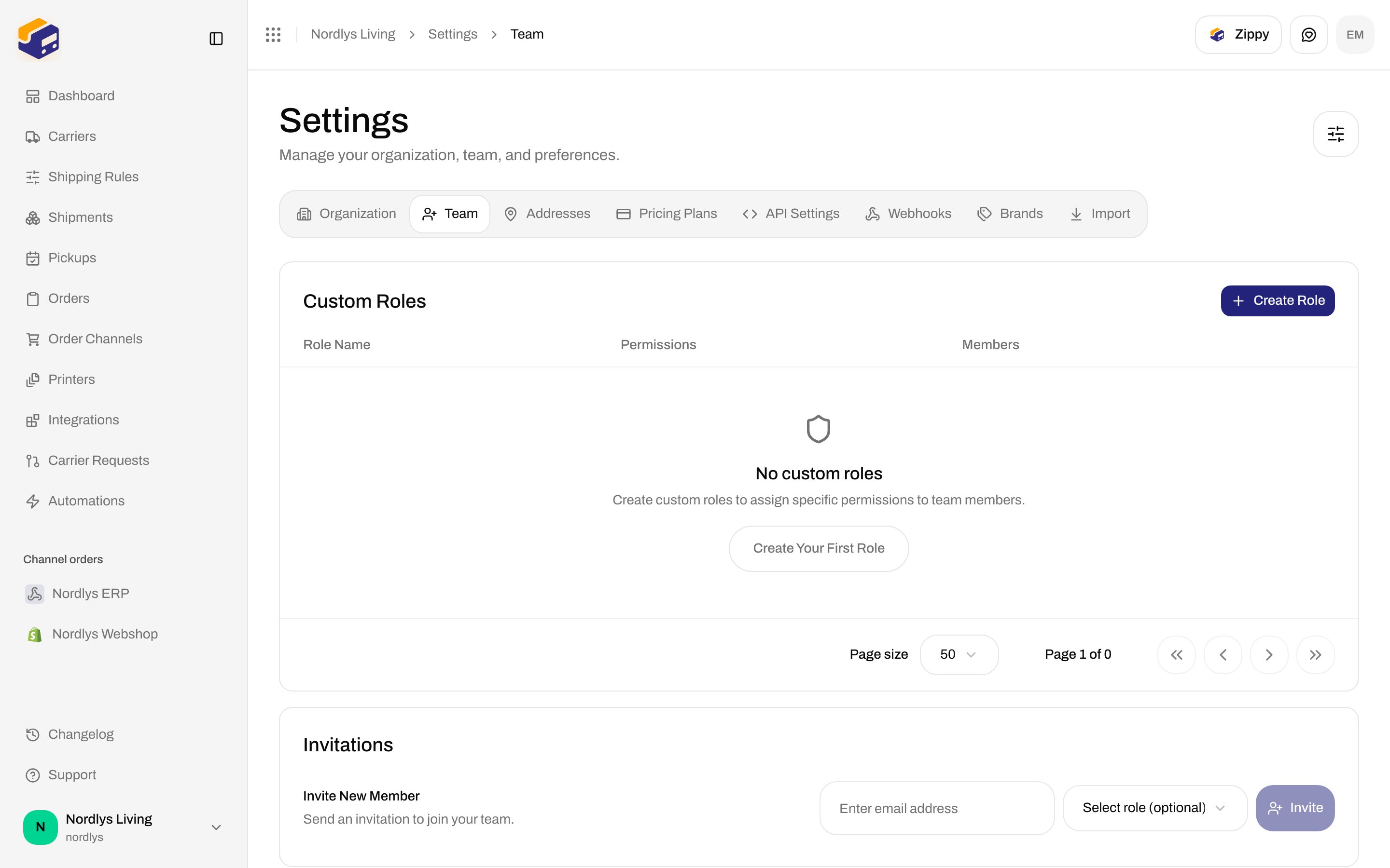 Team tab with an empty Custom Roles table and Invite New Member