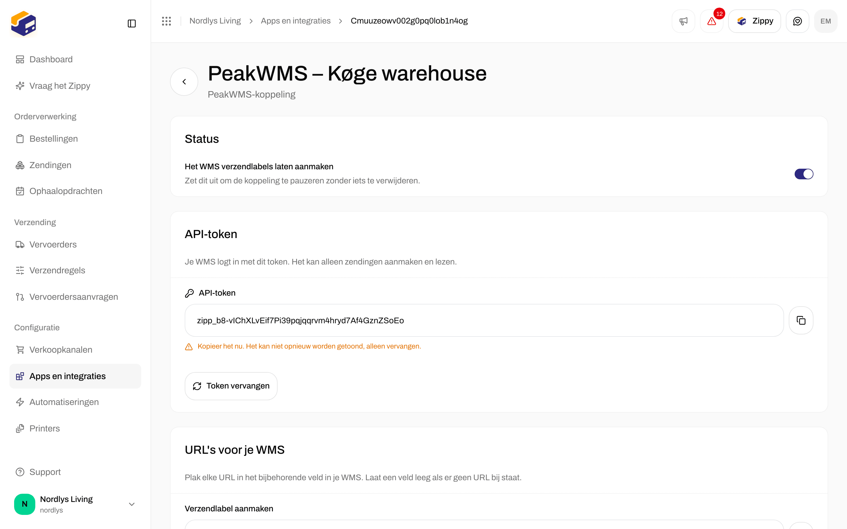 Onderdeel API-token op de koppelingspagina dat het API-token één keer toont, met een kopieerknop