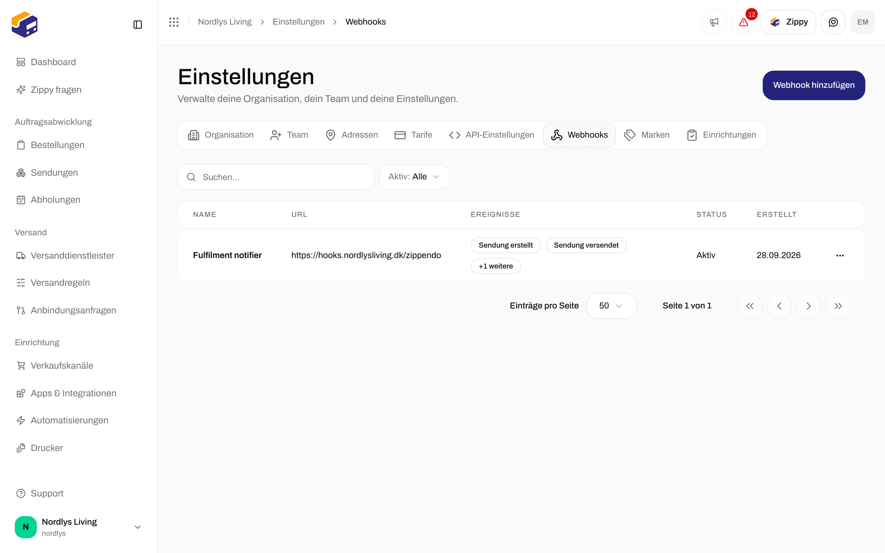 Webhook-Liste in den Einstellungen mit einem Webhook, der Ereignisse zu Sendungen und Sendungsverfolgung abonniert hat