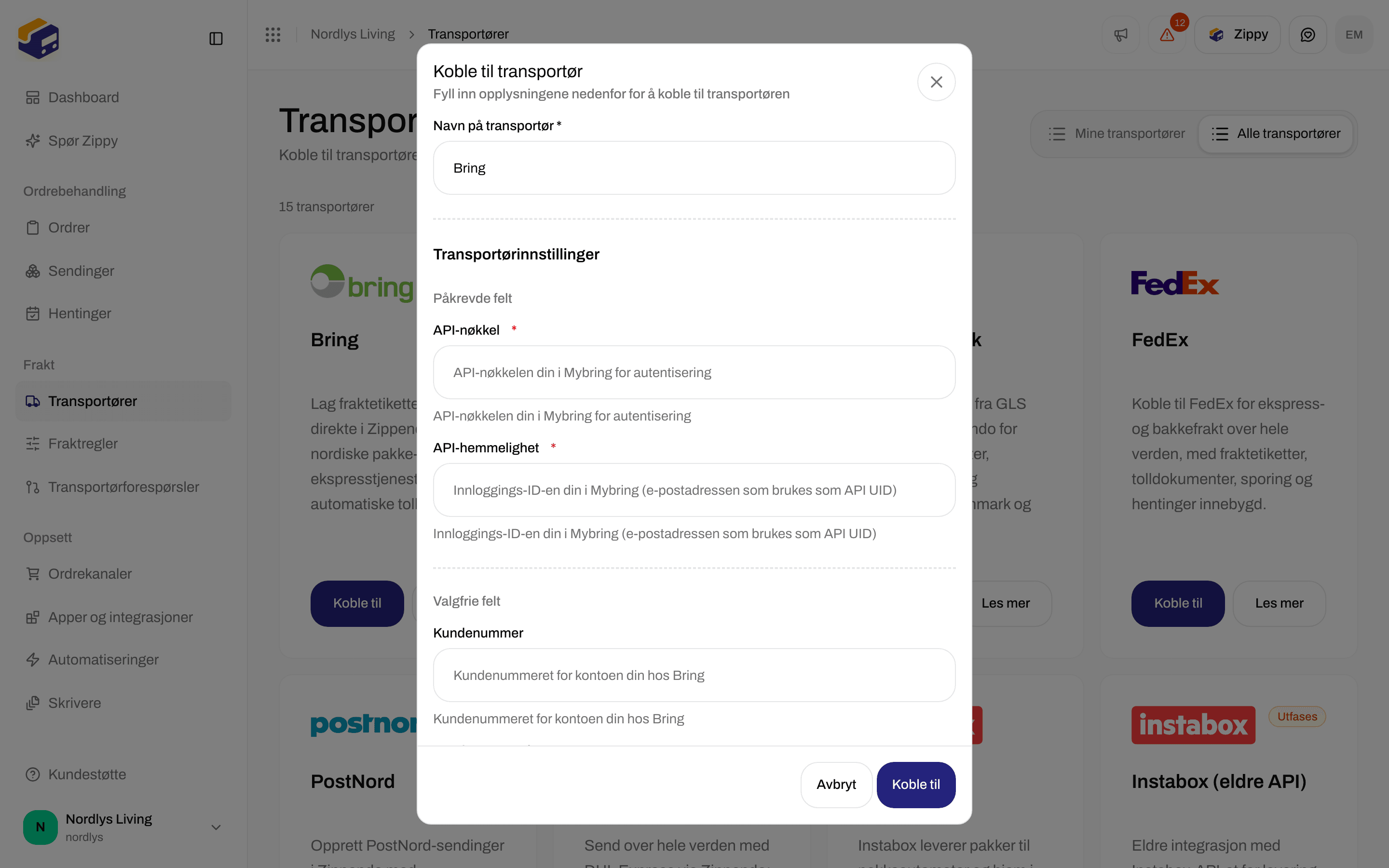 Vinduet Koble til transportør med Navn på transportør Bring og feltene for API-nøkkel og API-hemmelighet under Transportørinnstillinger