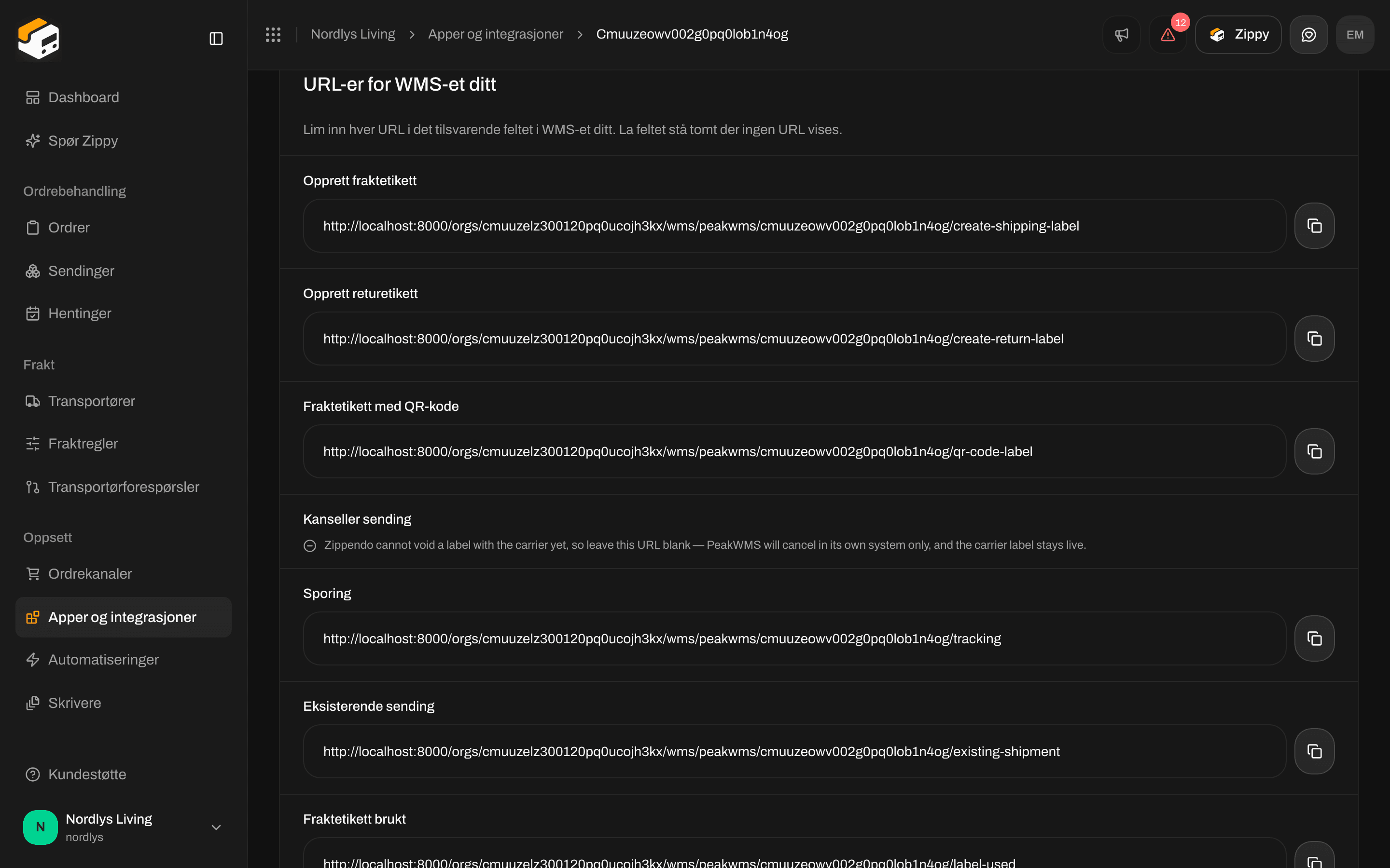 Seksjonen URL-er for WMS-et ditt som lister Opprett fraktetikett, Opprett returetikett, Fraktetikett med QR-kode, Sporing, Eksisterende sending og Fraktetikett brukt med kopieringsknapper