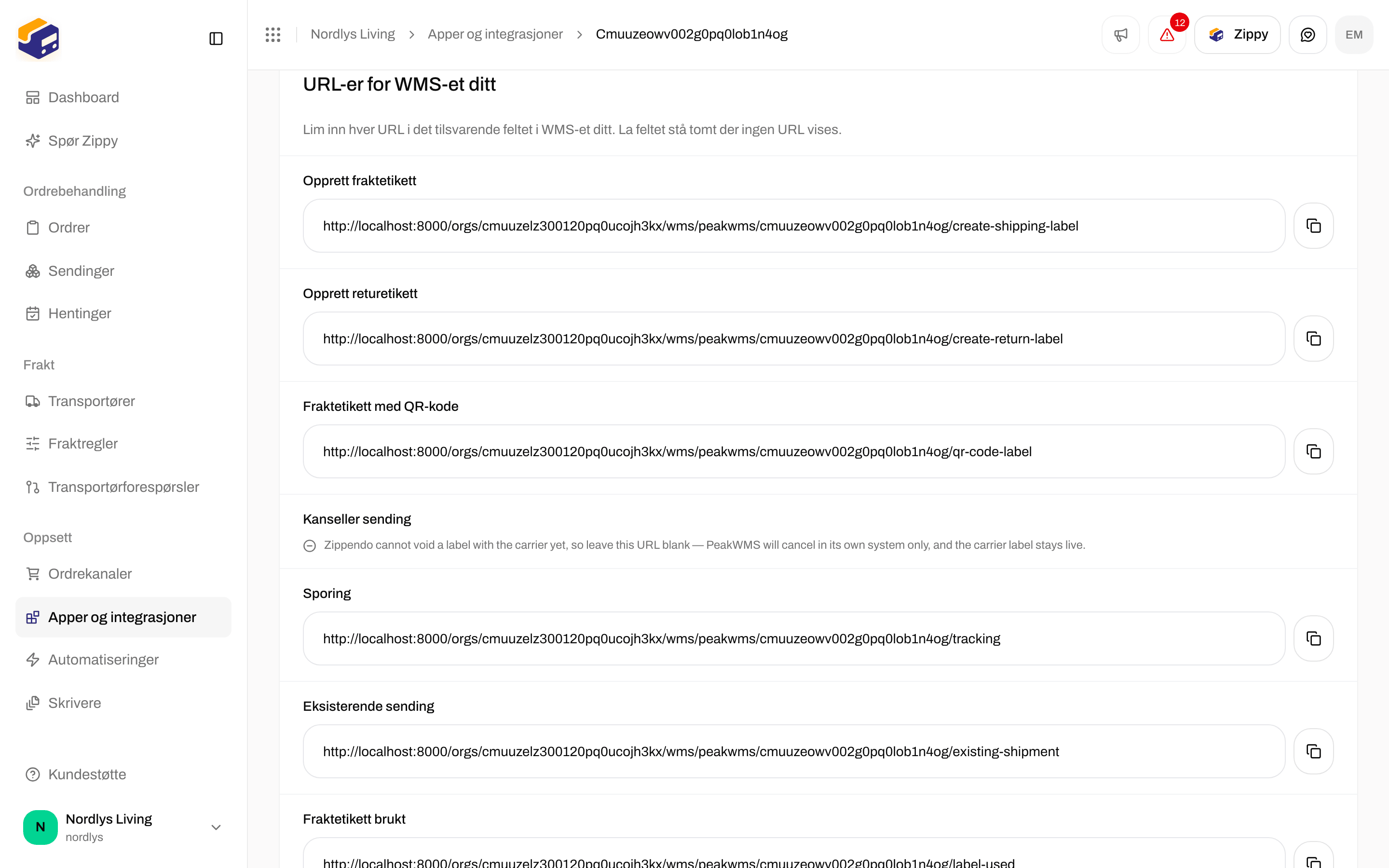 Seksjonen URL-er for WMS-et ditt som lister Opprett fraktetikett, Opprett returetikett, Fraktetikett med QR-kode, Sporing, Eksisterende sending og Fraktetikett brukt med kopieringsknapper