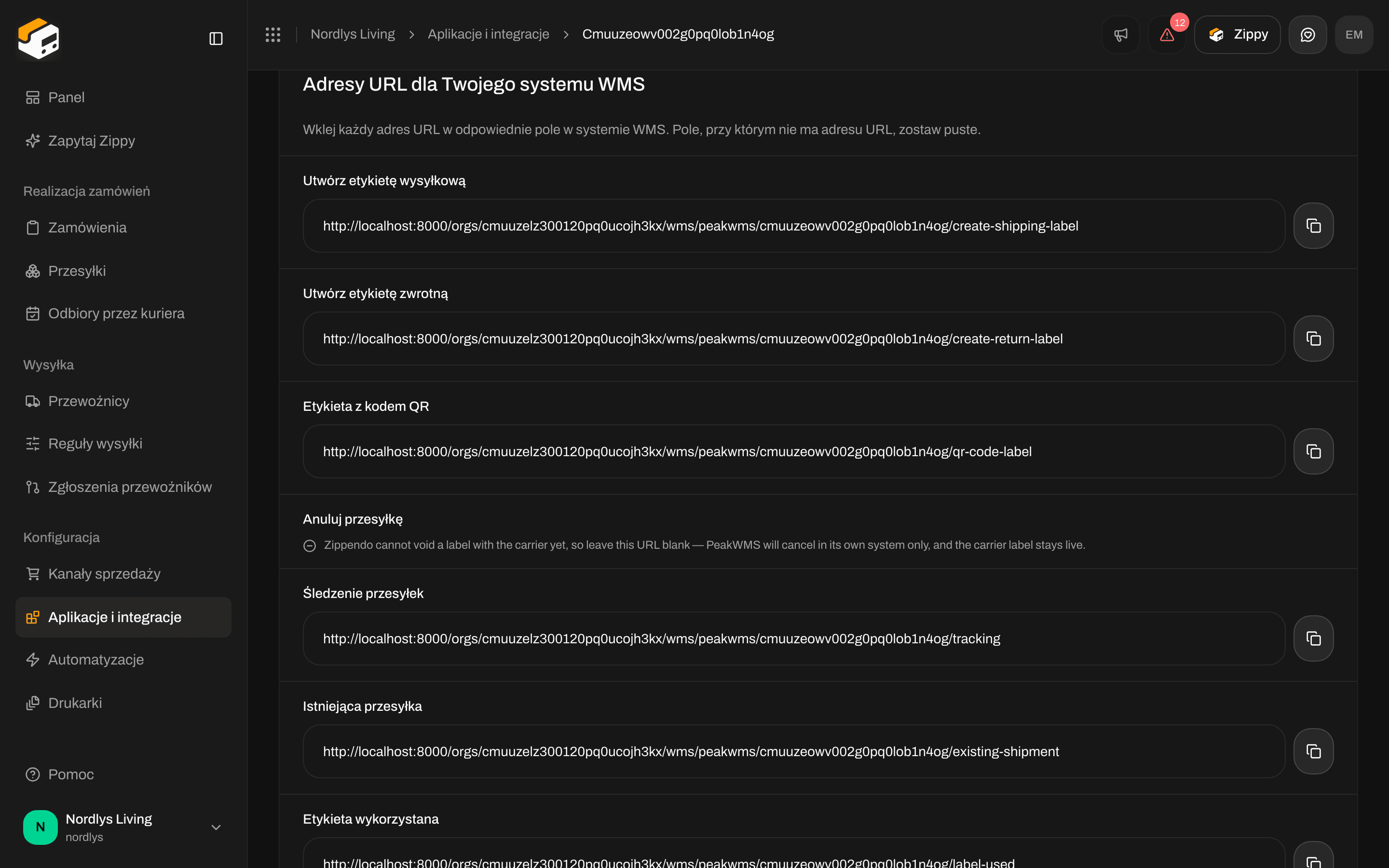 Sekcja Adresy URL dla Twojego systemu WMS z listą: Utwórz etykietę wysyłkową, Utwórz etykietę zwrotną, Etykieta z kodem QR, Śledzenie przesyłek, Istniejąca przesyłka i Etykieta wykorzystana, z przyciskami kopiowania