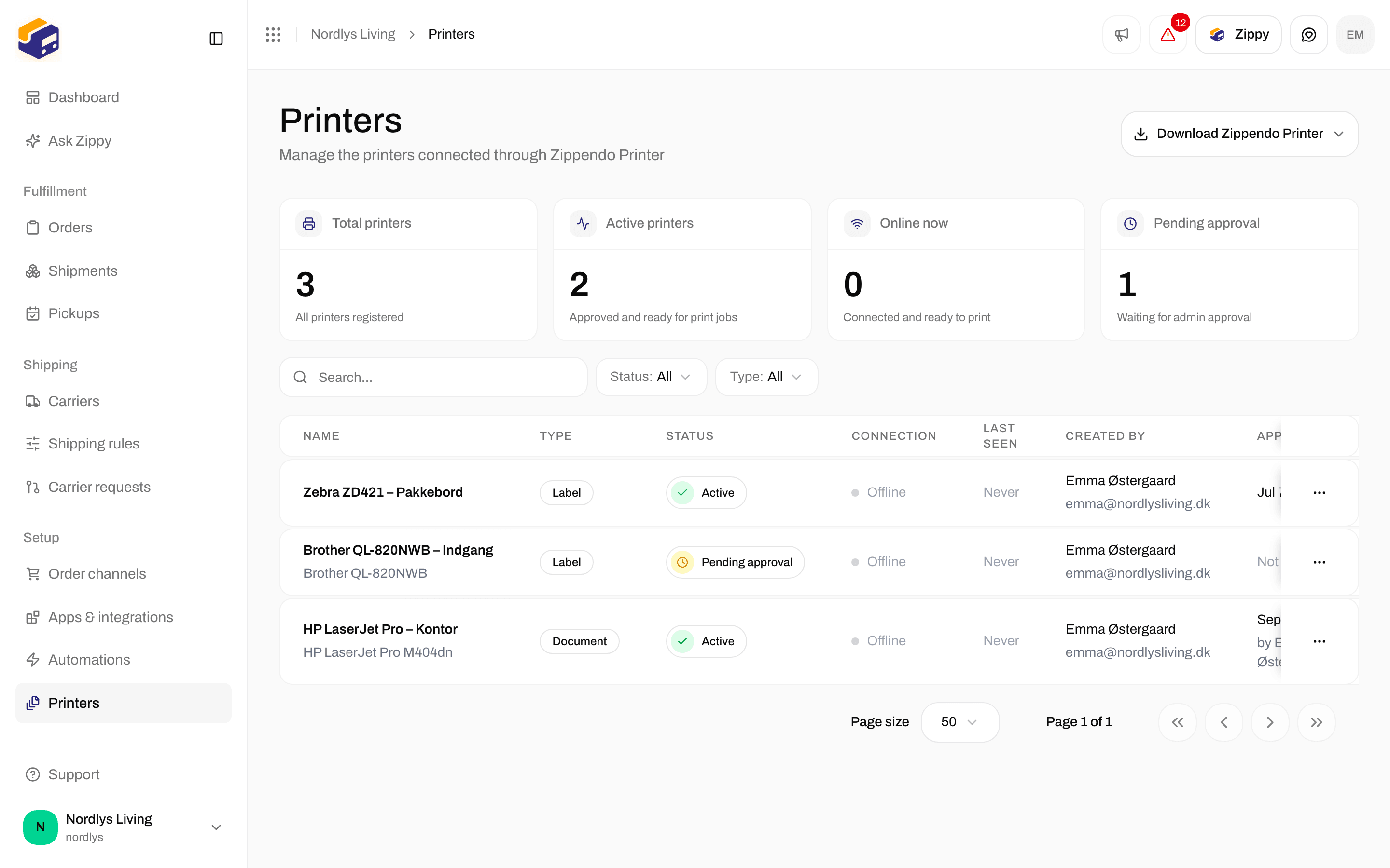 Printers page with counts, the download button, and a Zebra label printer