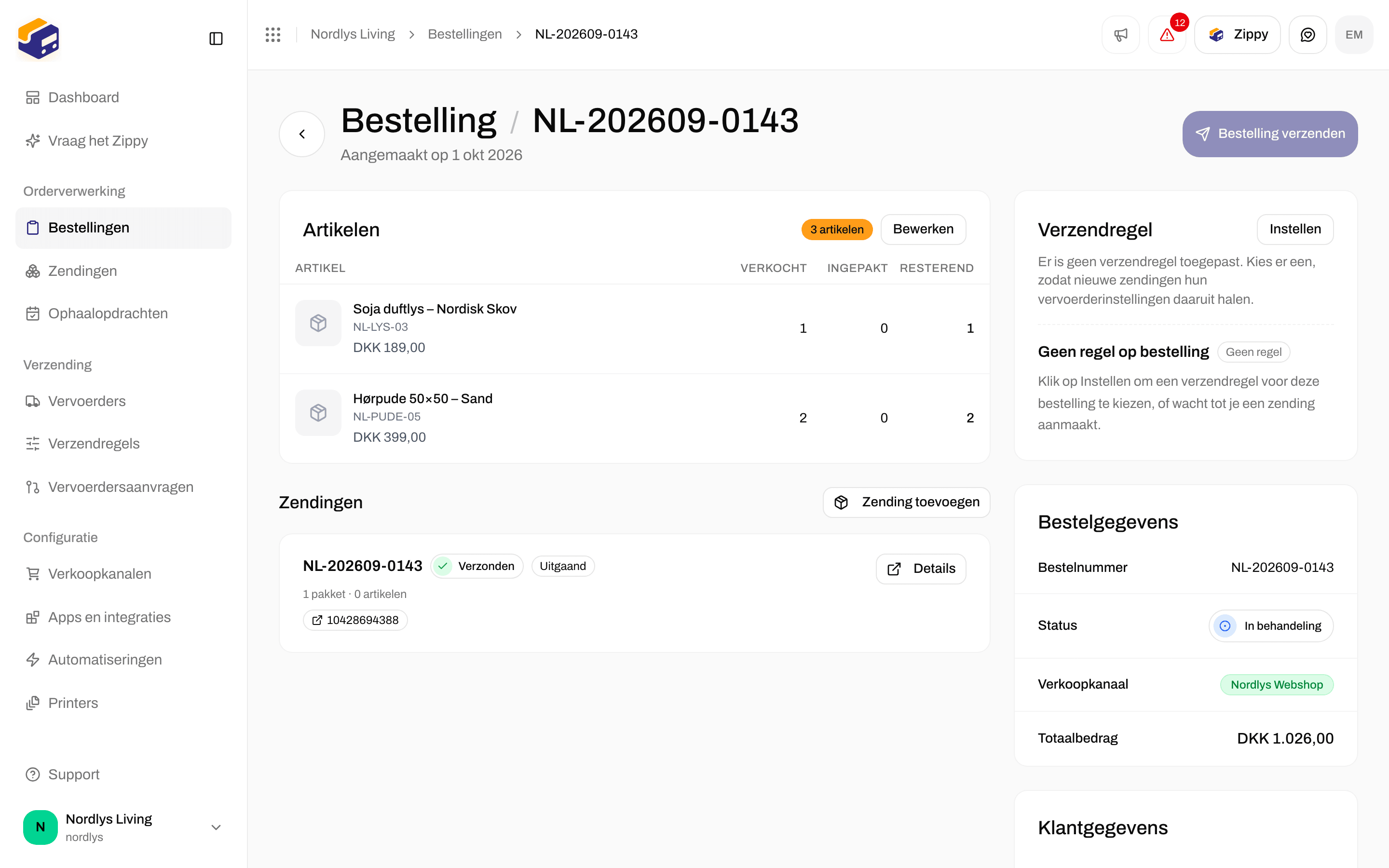 Sectie Zendingen van een bestelling met de kaart van een verzonden uitgaande zending en Details