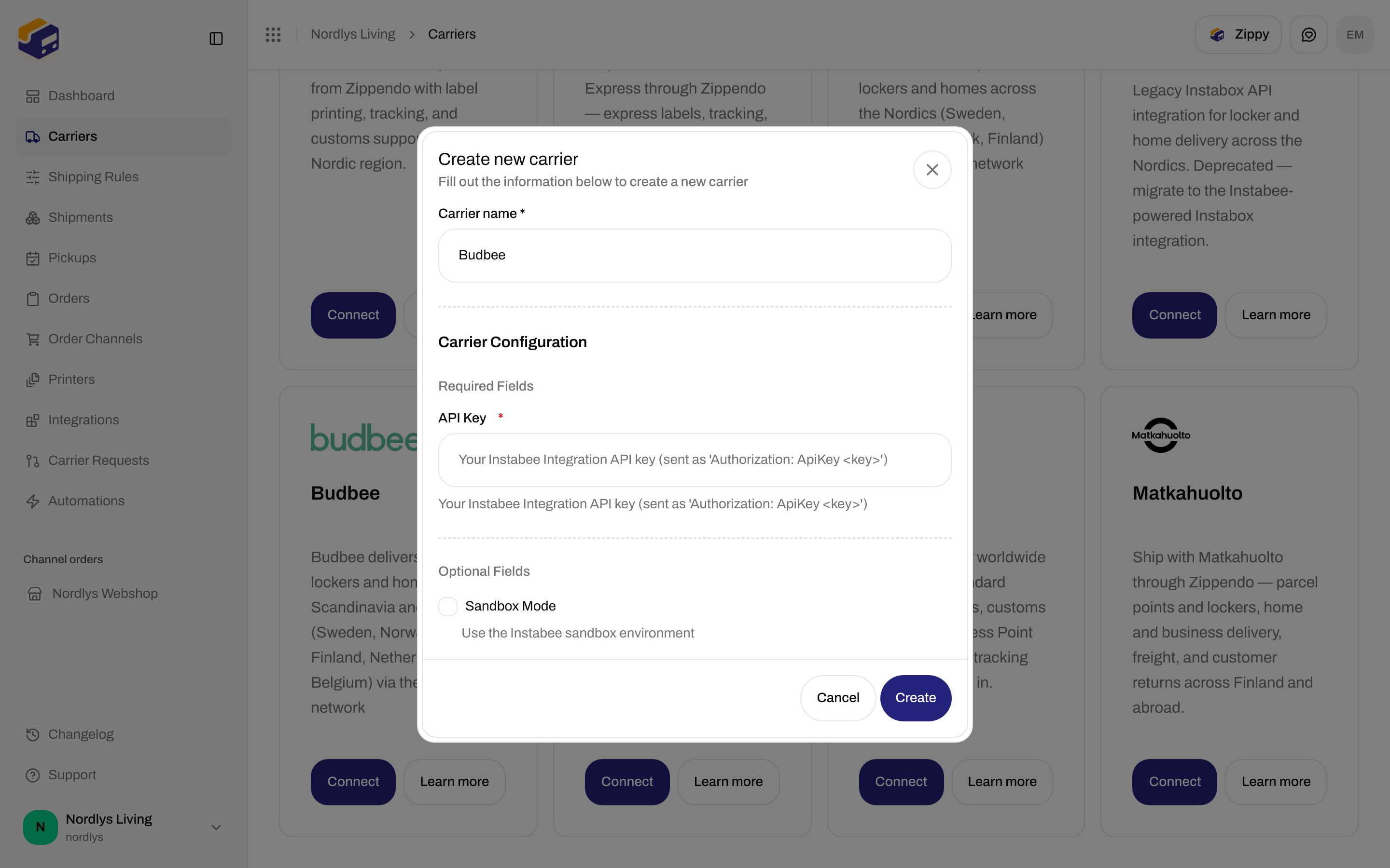 Create new carrier dialog for Budbee with required API Key and optional Sandbox Mode