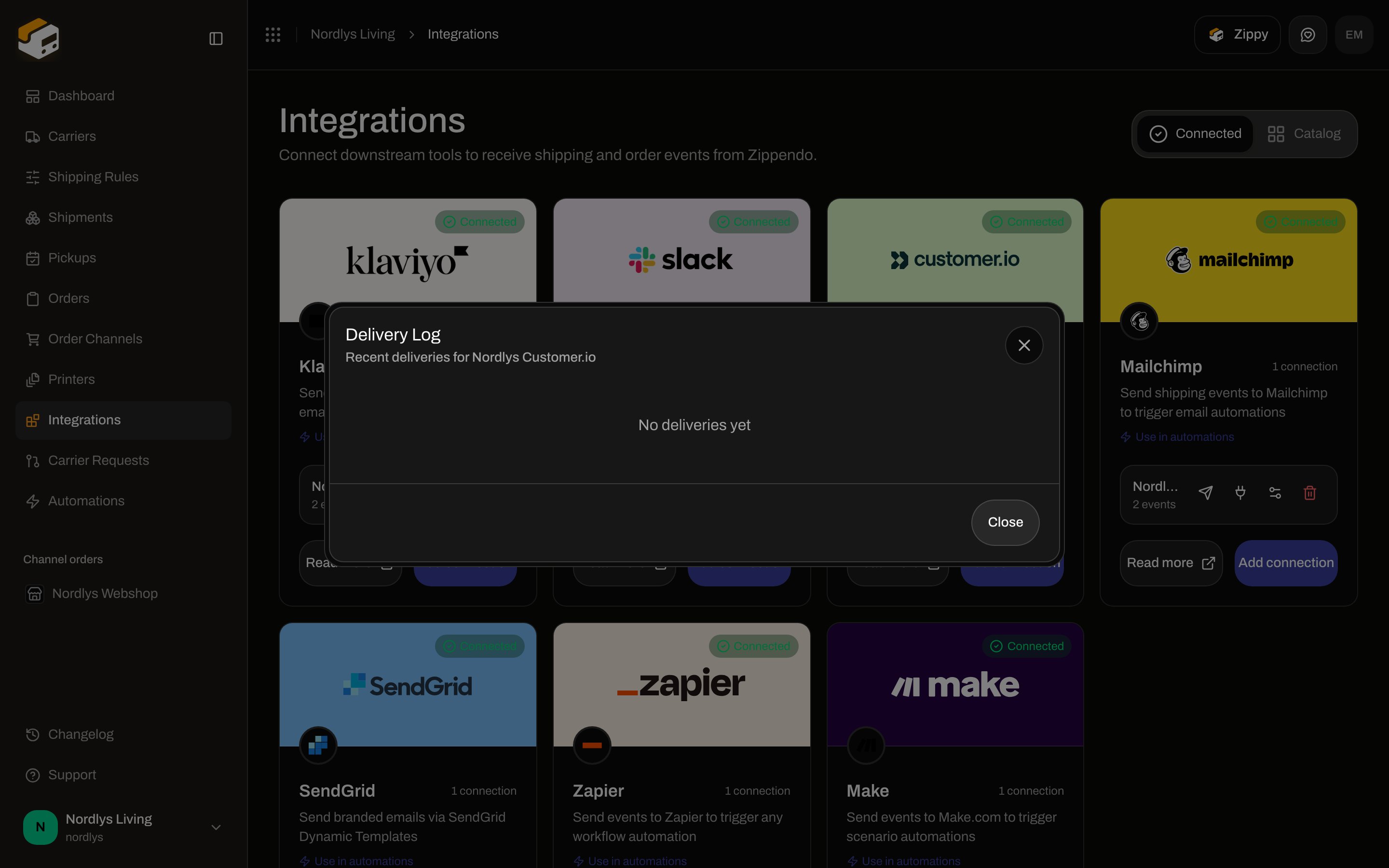 Delivery Log modal showing No deliveries yet for a Customer.io connection