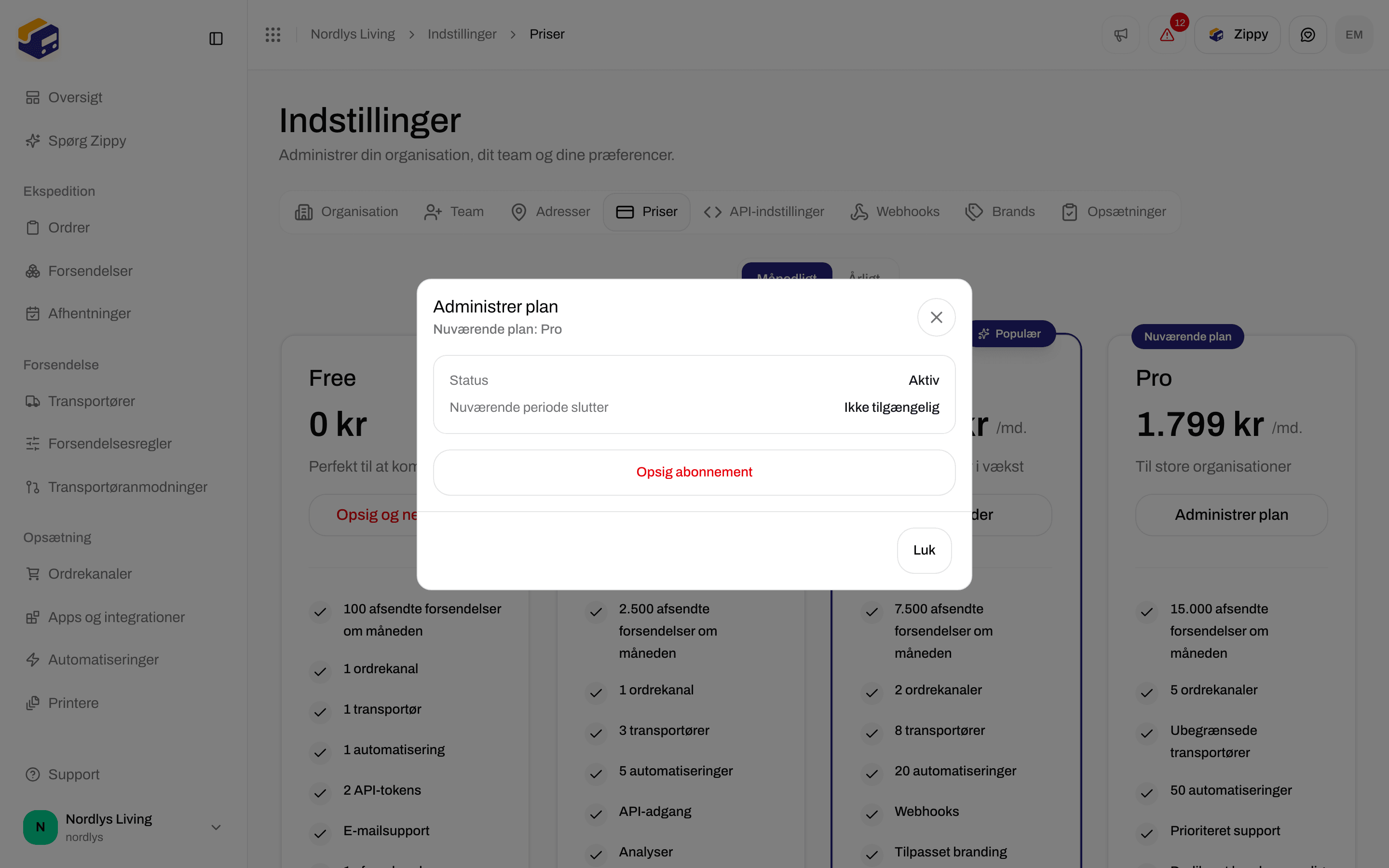 Vinduet Administrer plan med nuværende plan, status og Opsig abonnement