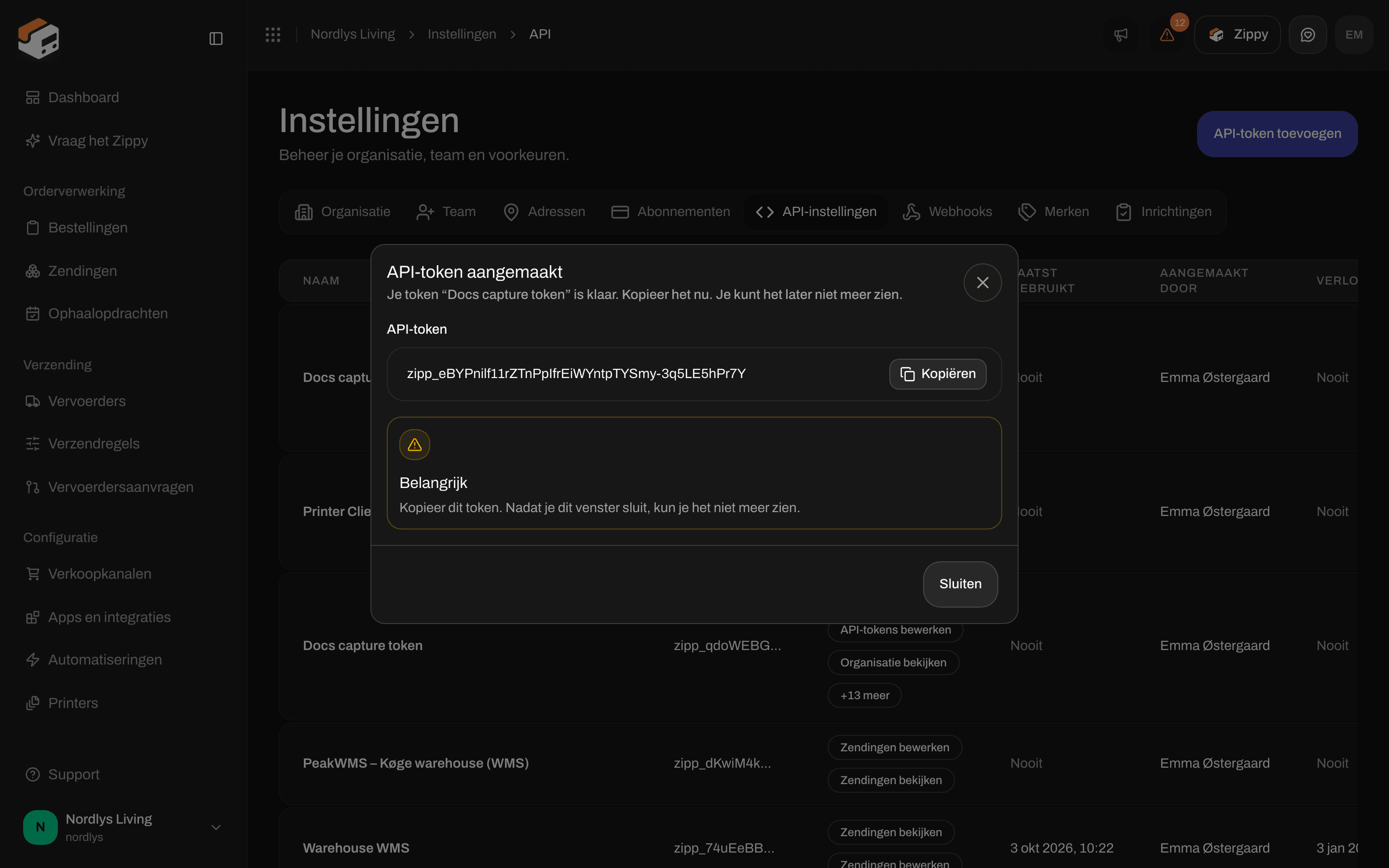 Venster API-token aangemaakt met het token, een knop Kopiëren en een waarschuwing Belangrijk