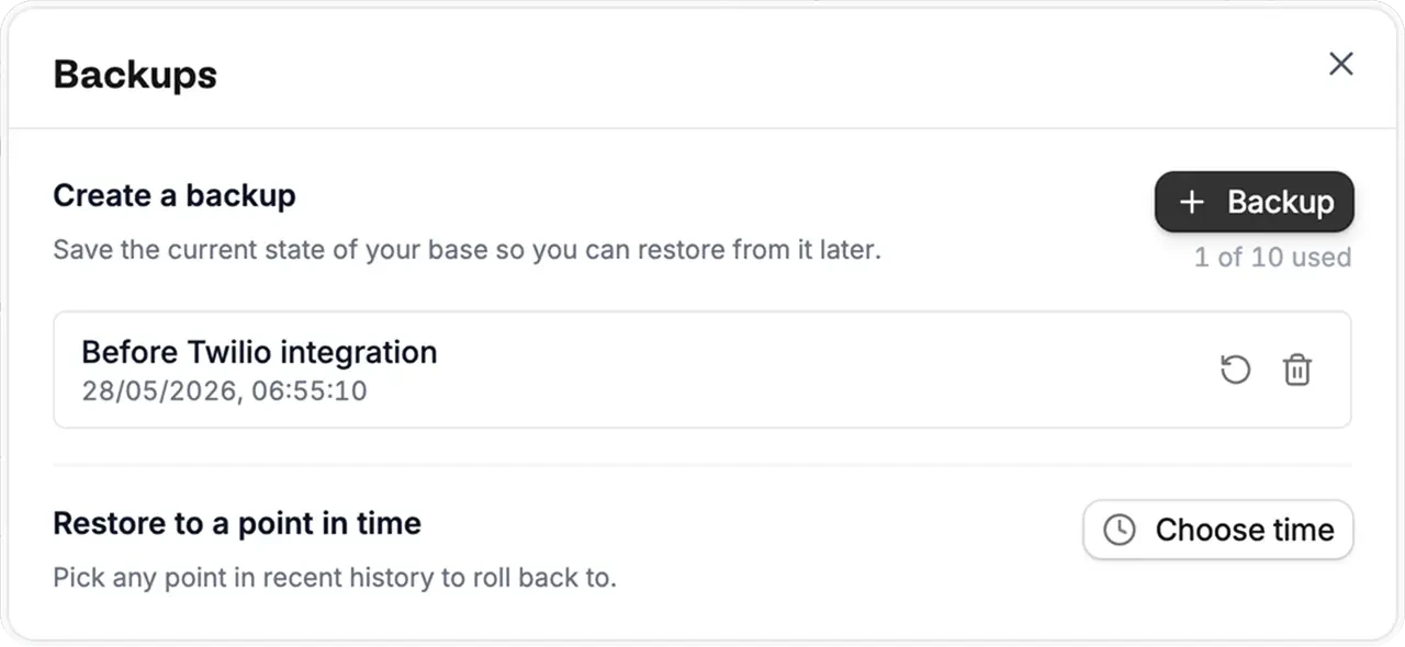 Backups panel with a saved backup and restore to a point in time option