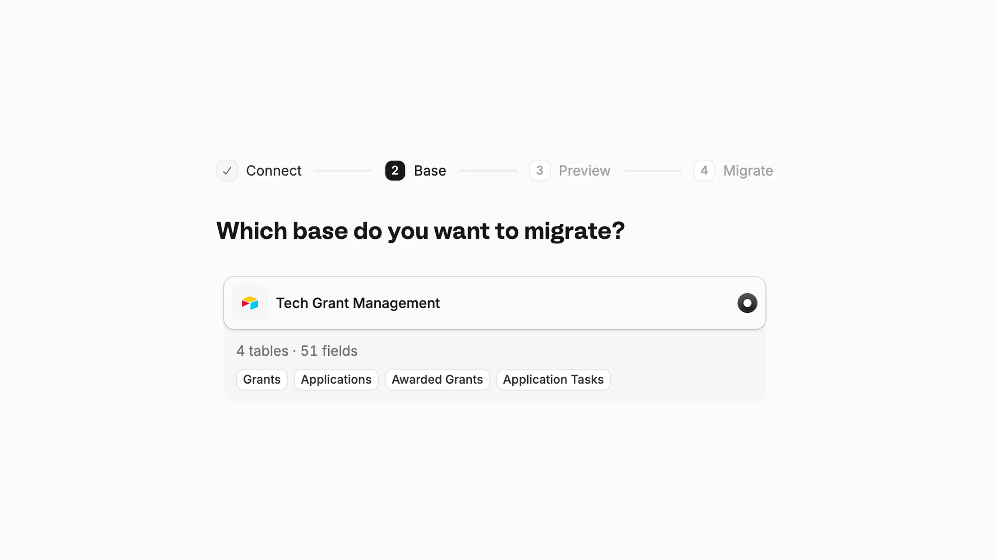 Airtable migration screen for selecting a base and reviewing its tables and fields